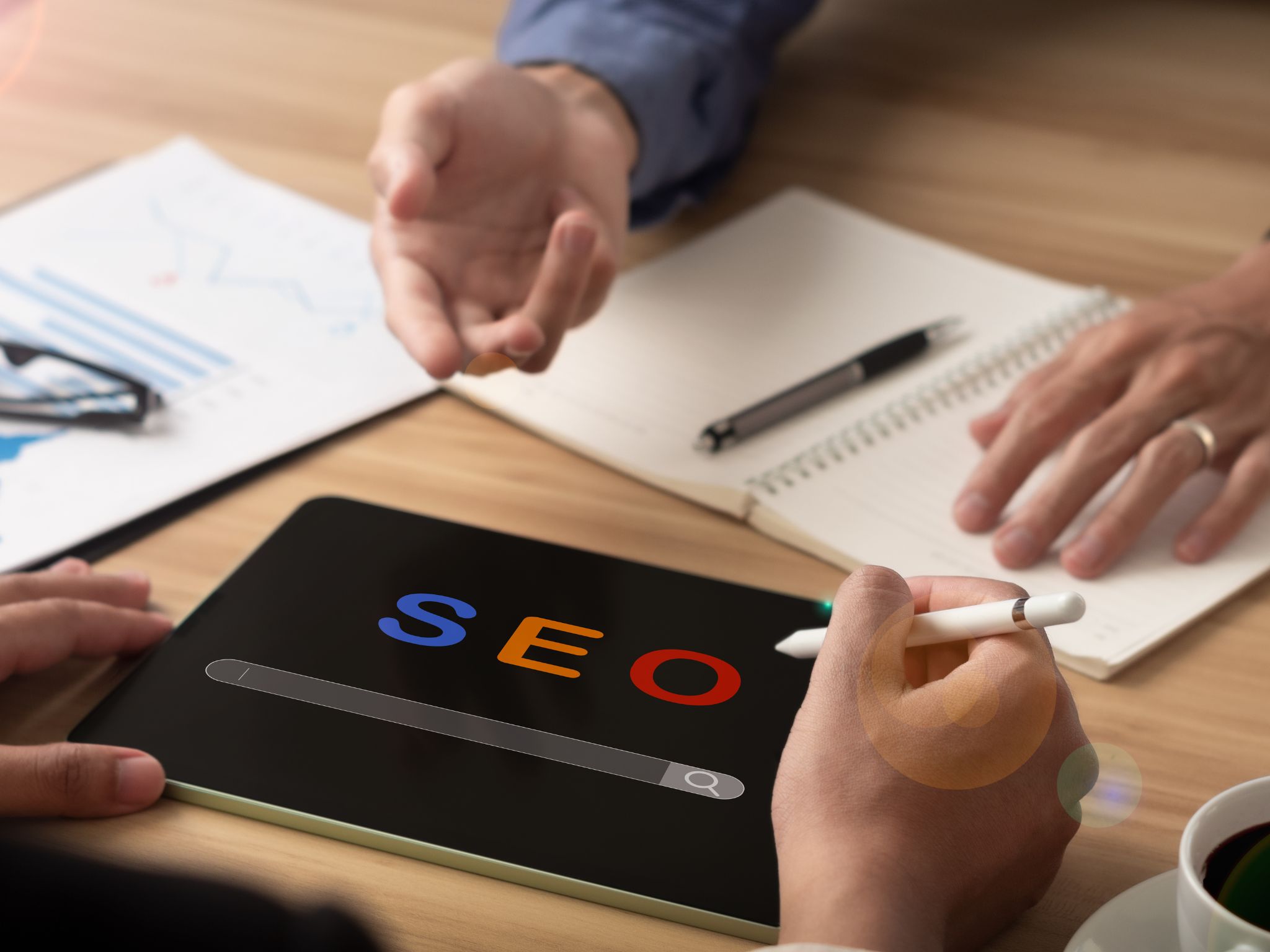 Business owner reviewing online visibility strategy with local SEO keywords on screen.