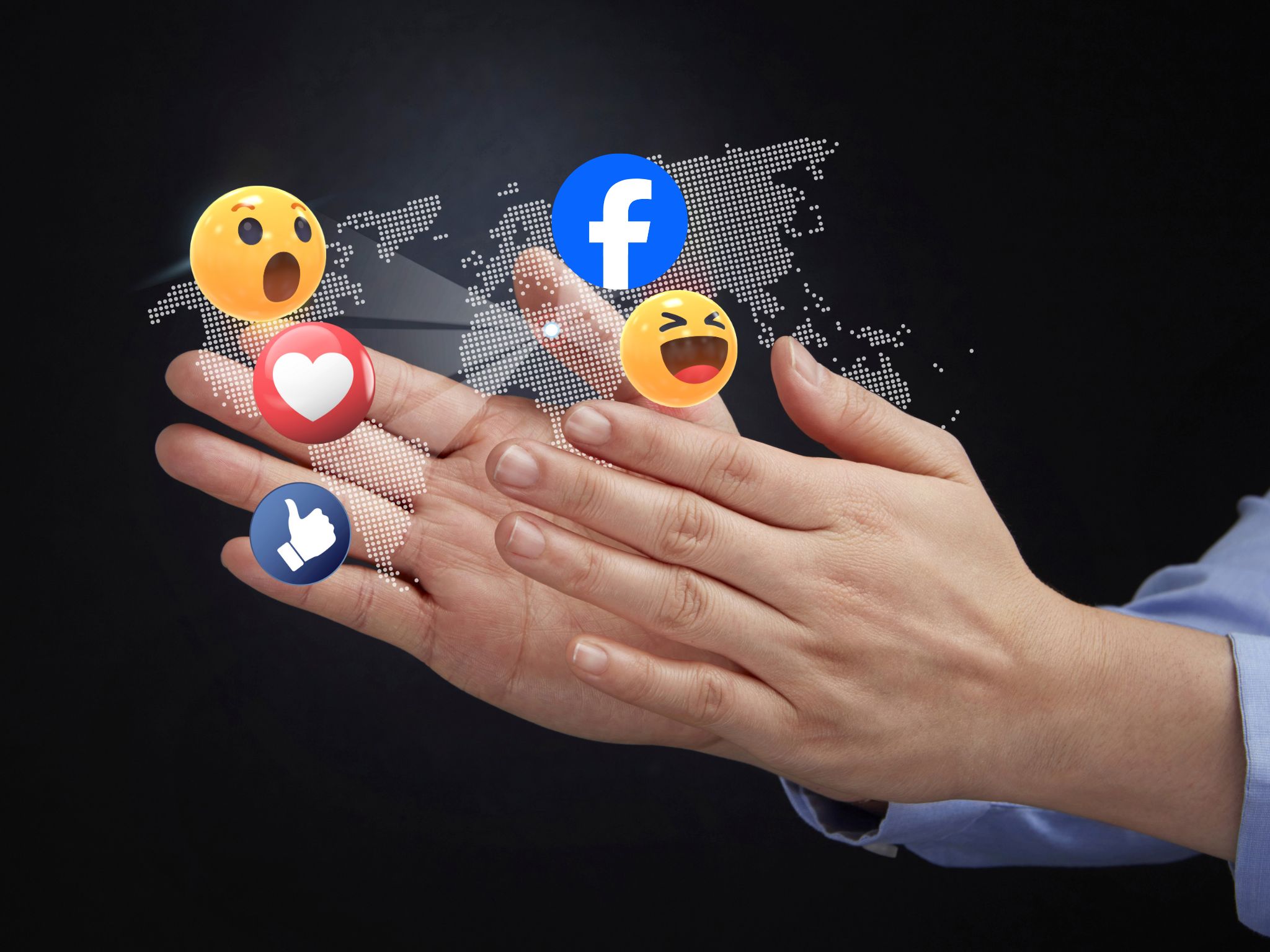 A digital marketer holding out to facebook growth emojis