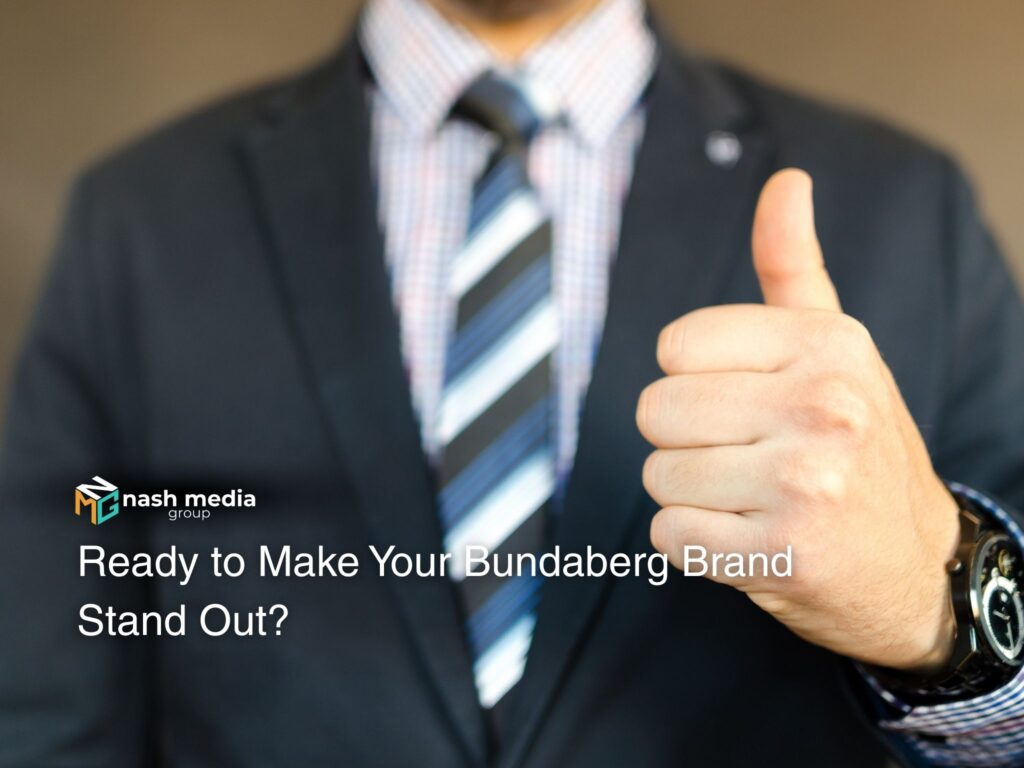 A business owner making a thumbs up. 