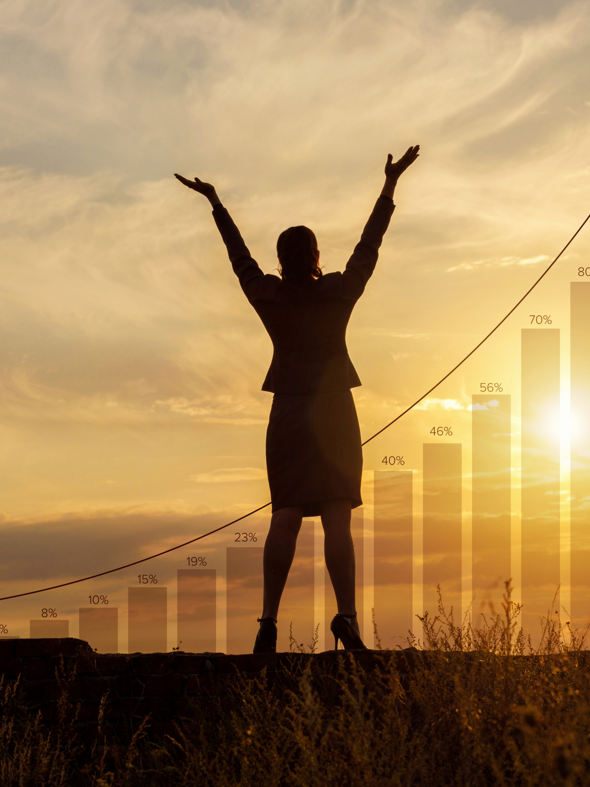 Person celebrating success at sunrise representing business growth through social media marketing