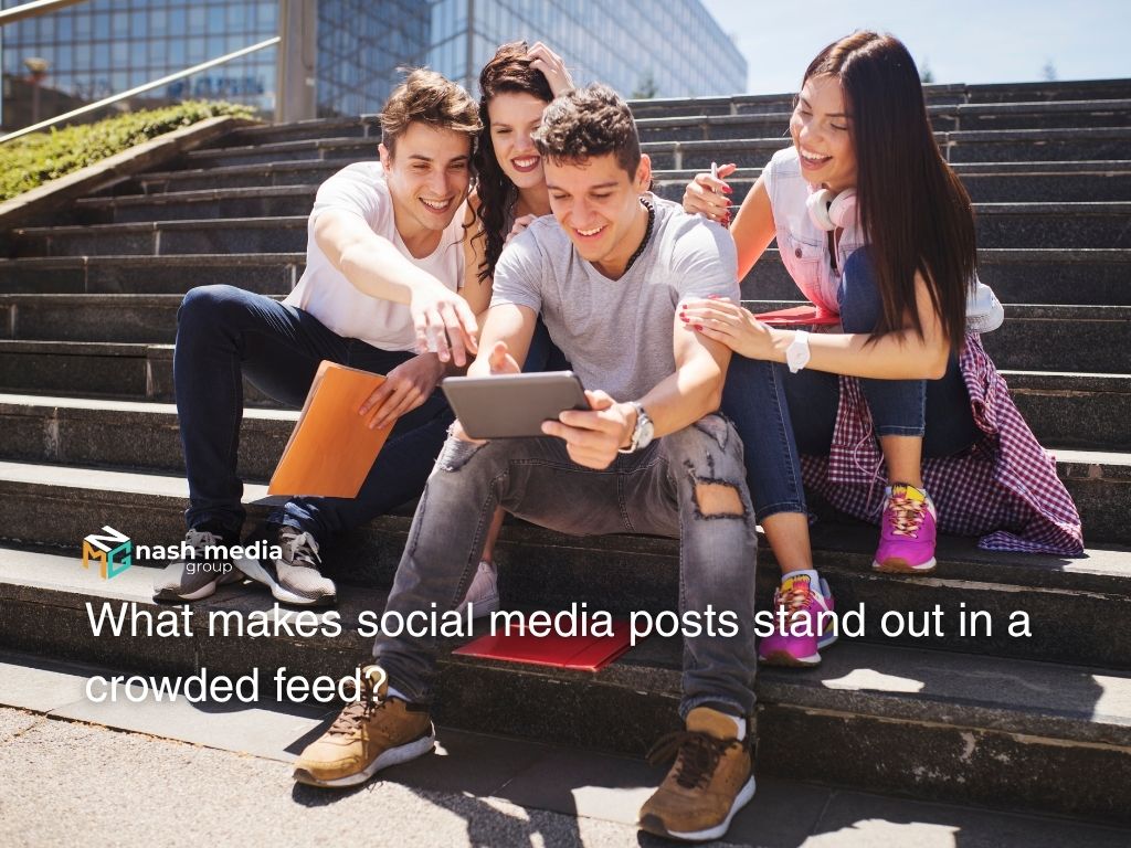 Group of young people using a tablet together, representing engaging and shareable social media content