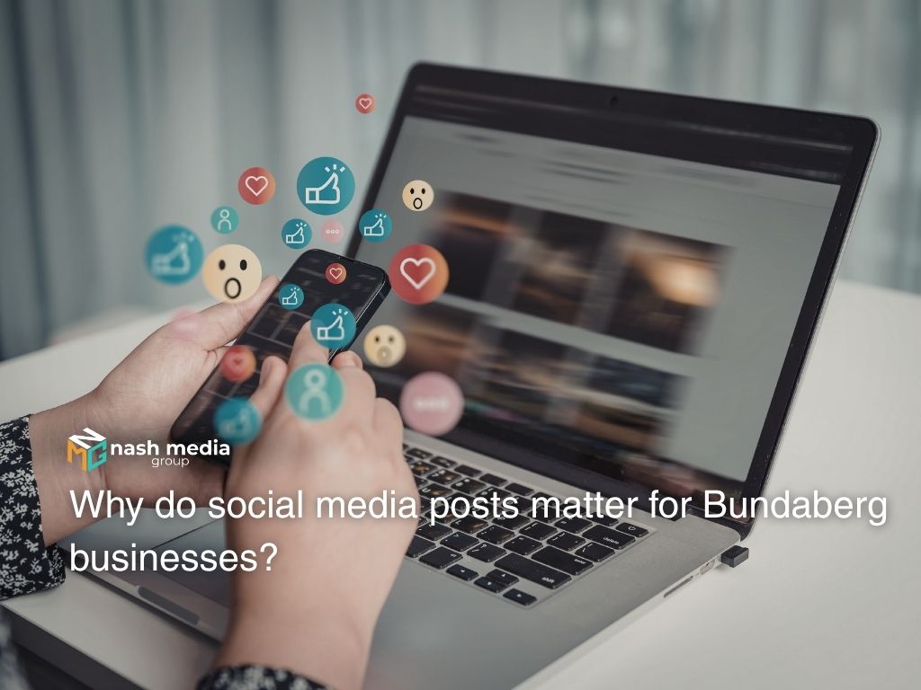 Person using a laptop and smartphone to manage social media posts and engagement