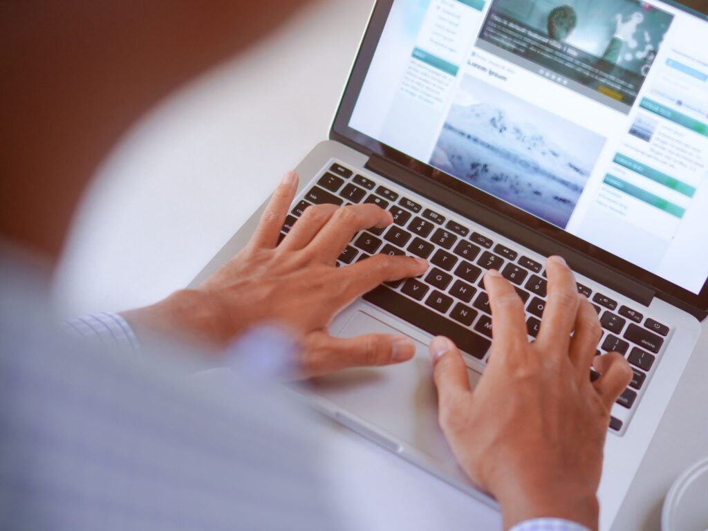 A man working on the website backend.
